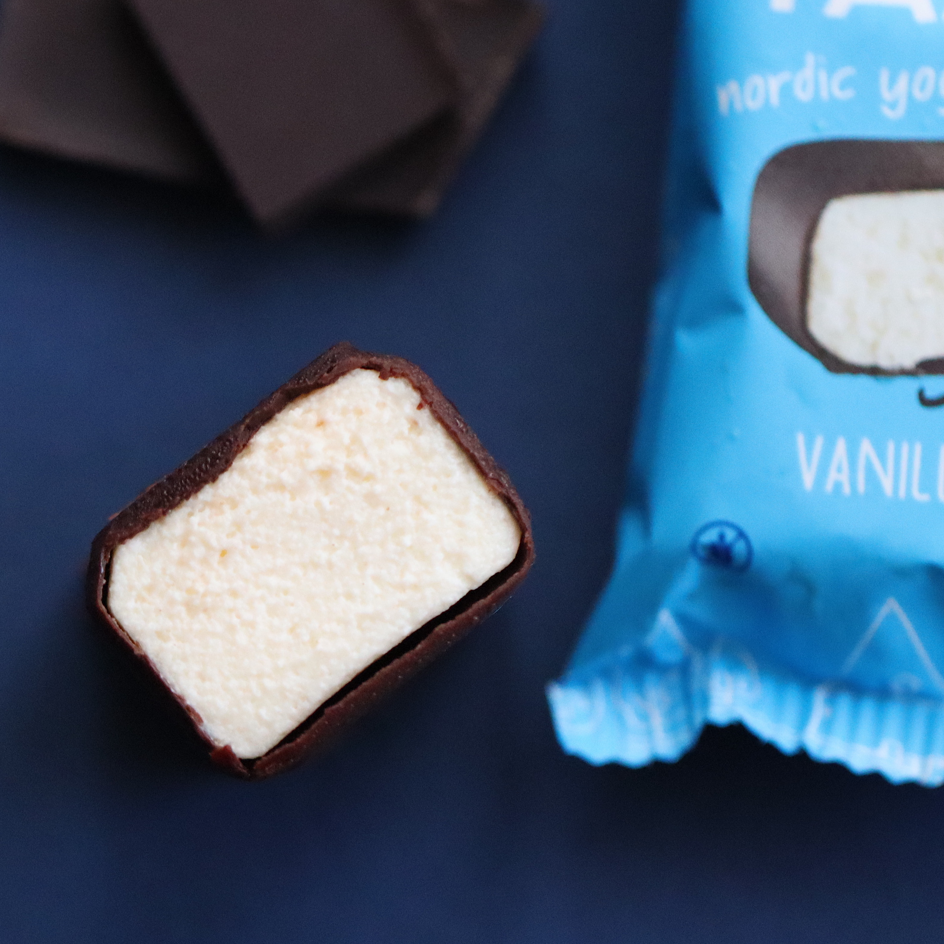 YAAR vanilla single bar beside its blue individual wrapper